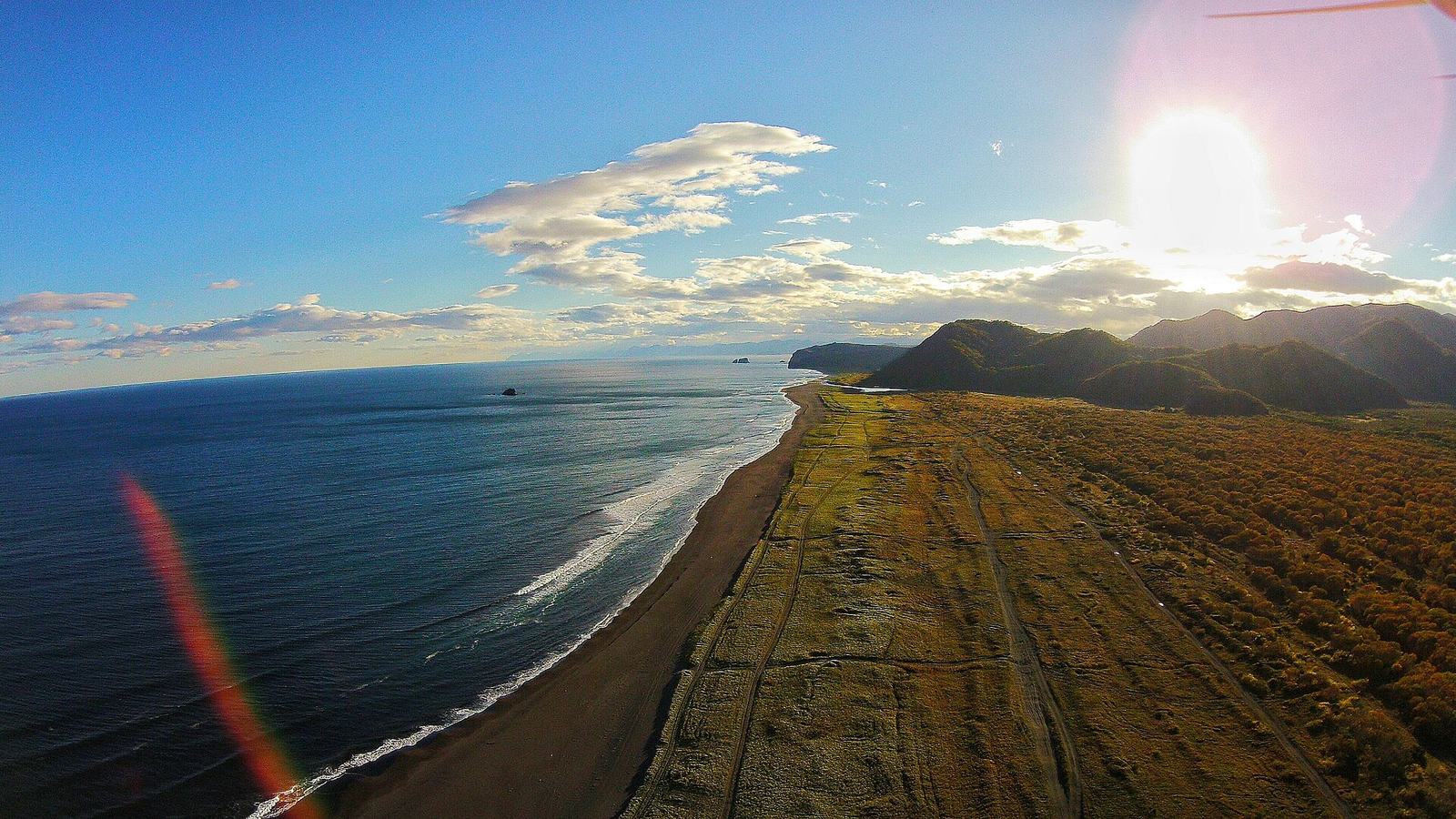 Black volcanic sand of Khalaktyrsky Beach
